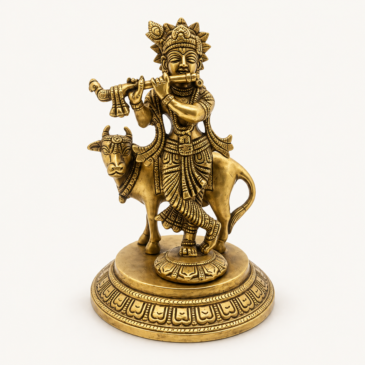 Krishan With Cow Brass Statue on a warm white studio background